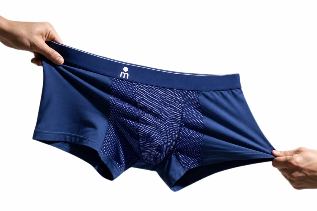 Hands stretching navy Majella underwear