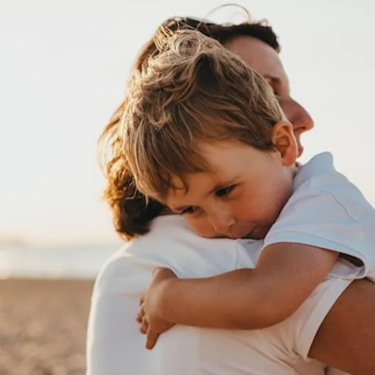 Father hugging his son